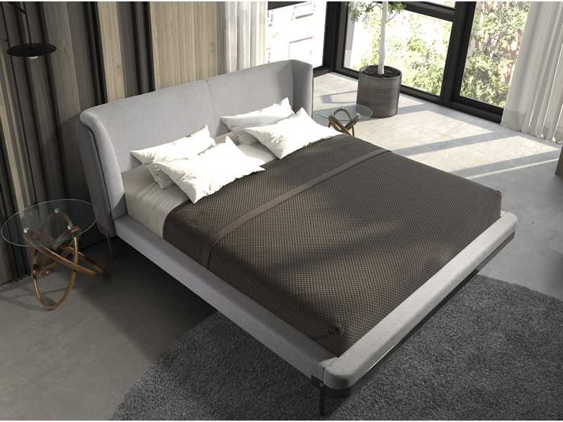 Complete upholstered bed with stainless steel bases - CESARE