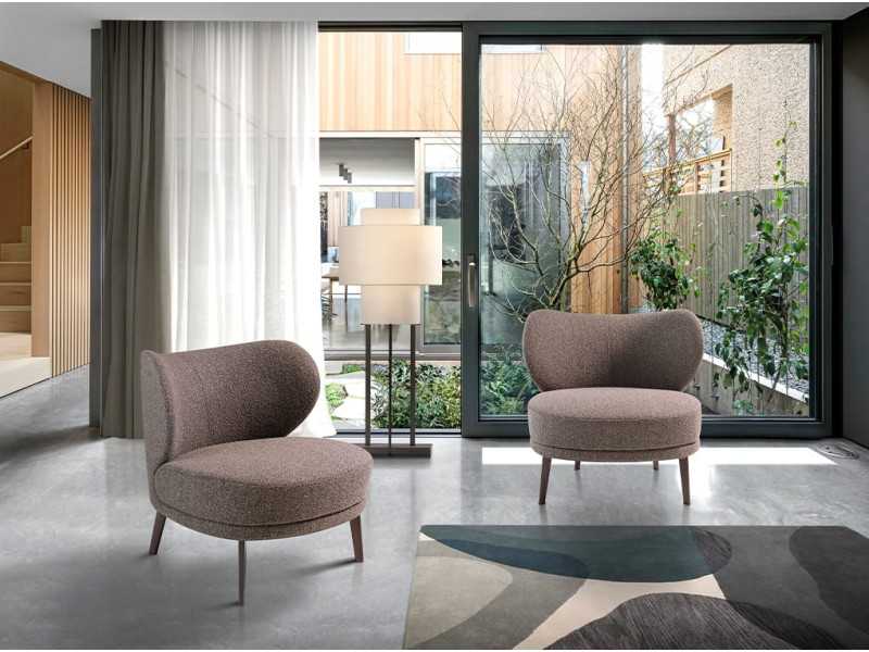 Upholstered designer armchair with steel legs - AIMÉE