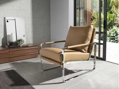 Upholstered armchair with stainless steel structure - COSMET