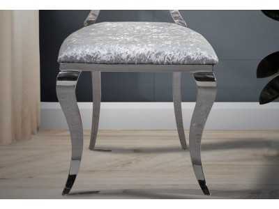 Silla de diseño con estructura en acero inoxidable - CONQUE