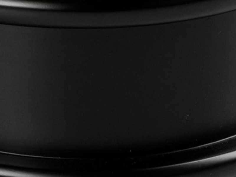 Pouf de diseño tapizado en piel sintética y base lacada negro brillo - ANEESA