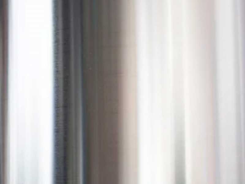 Meuble TV design en noyer et pieds inox - NINO