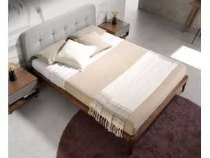 Walnut bed with capitonne upholstered headboard - UCLÉS
