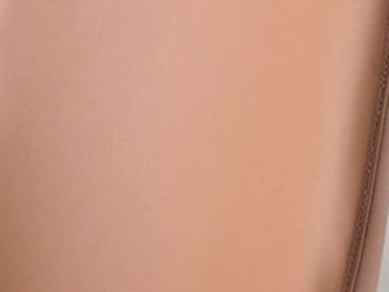 Designer chair upholstered in brown faux leather - ZANTE