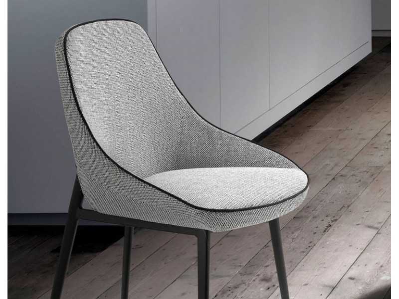 Upholstered designer chair with black stainless steel frame - SALLY