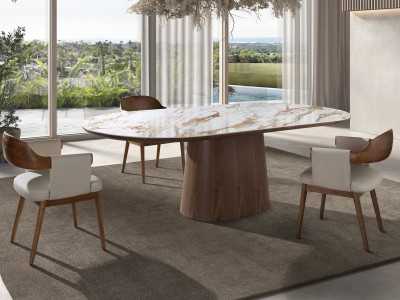 Mesa de comedor chapada en nogal con tapa ovalada de mármol porcelánico - AAL Mesa de comedor chapada en nogal con tapa ovalada de mármol porcelánico - AAL