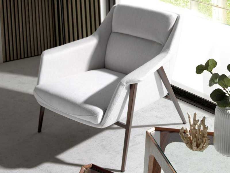 Sillón tapizado con estructura en acero inoxidable lacado - WILSON