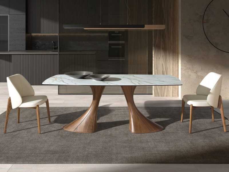 Mesa de comedor con tapa de mármol porcelánico y patas de nogal - ABATTO
