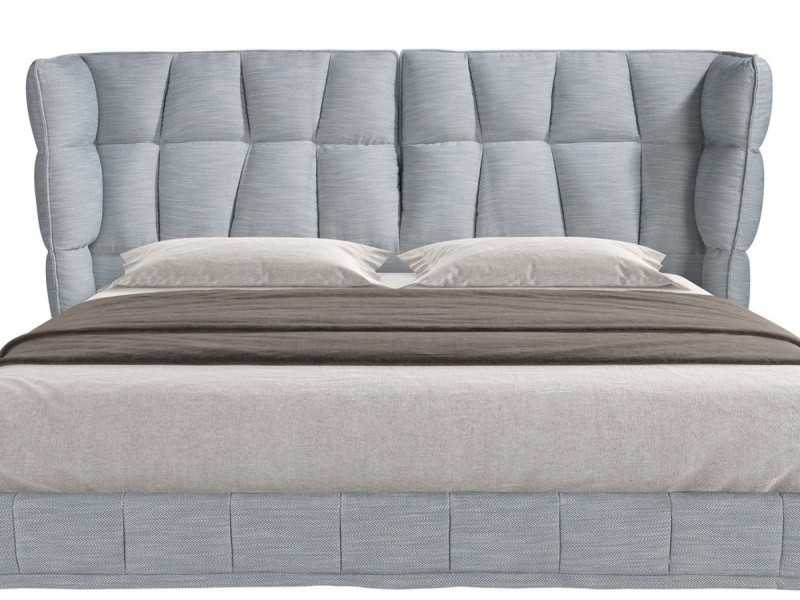 Cama completa de diseño moderno tapizada en tela con patas de acero inox - DINA