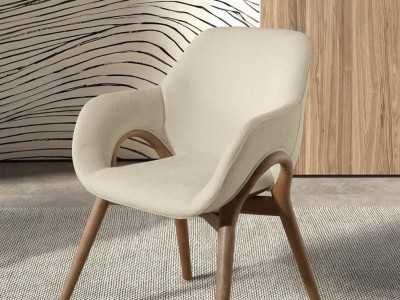 Designer chair upholstered in fabric with solid wood frame - ABBA