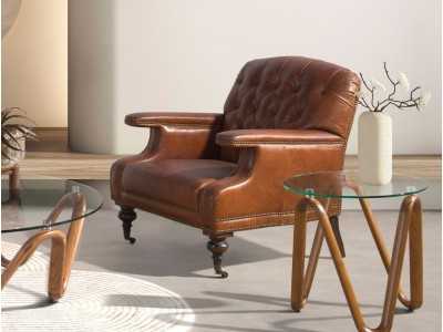 Fauteuil Chesterfield classique, tapissé de cuir véritable et monté sur roulettes - ARIANO