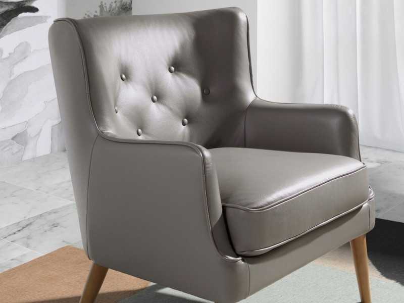 Fauteuil Chesterfield tapissé de cuir véritable gris foncé